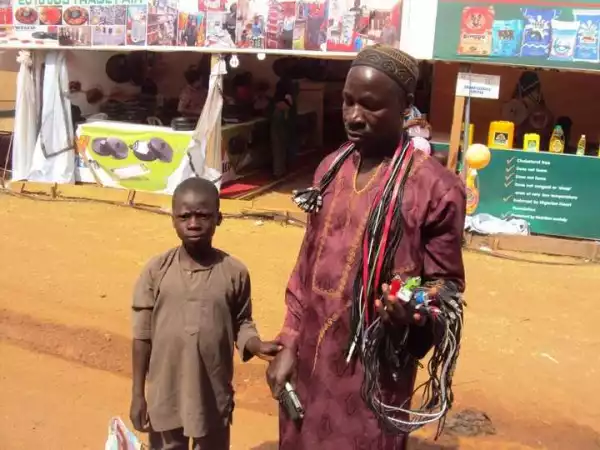 See Photos Of A Blind Man Selling Phone Cords & Chargers In Jos